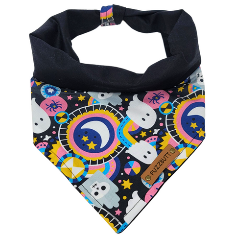 front view of a handmade Halloween dog bandana or handmade Halloween cat bandana with colorful shapes, ghosts, skulls, spiders, moons; this pattern is called Bright Ghosts 