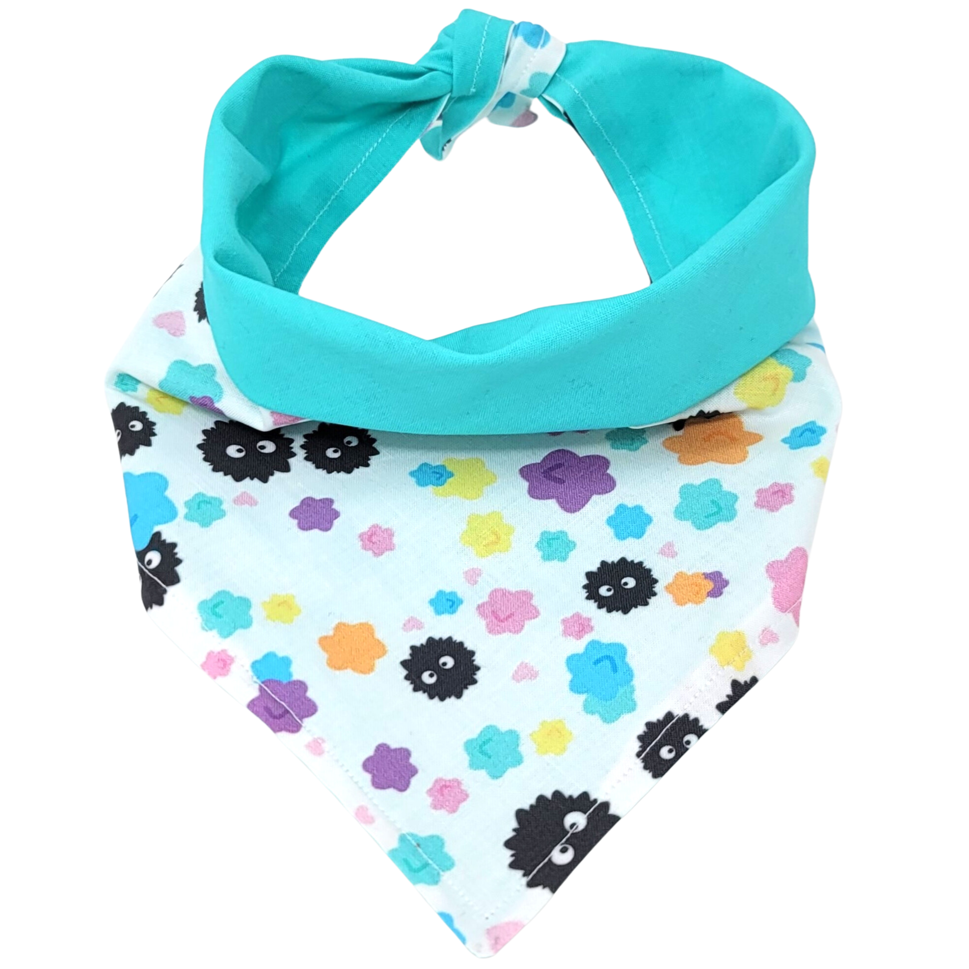 front view of a handmade Studio Ghibli dog bandana or handmade Studio Ghibli cat bandana featuring black soot sprites among colorful flowers; this pattern is called Soot Sprites